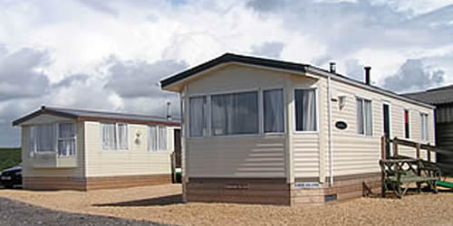 Static caravan at Bay View Farm Camping Site overlooking Looe Bay, Cornwall